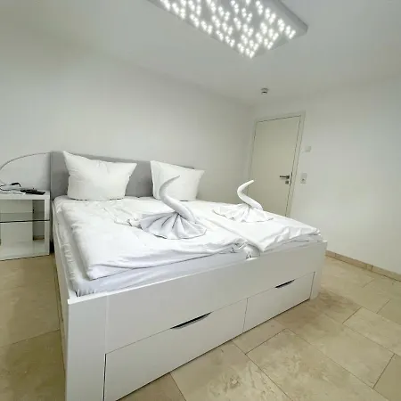 Апартаменты Feriendomizile Zum Strandkorb Остзебад Бинц